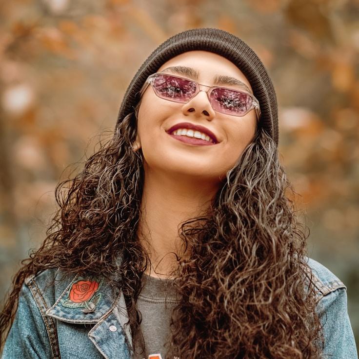 Kaveri Mehta, Lead Design Curator at TableSupplyGarden, reviewing corporate floral arrangements